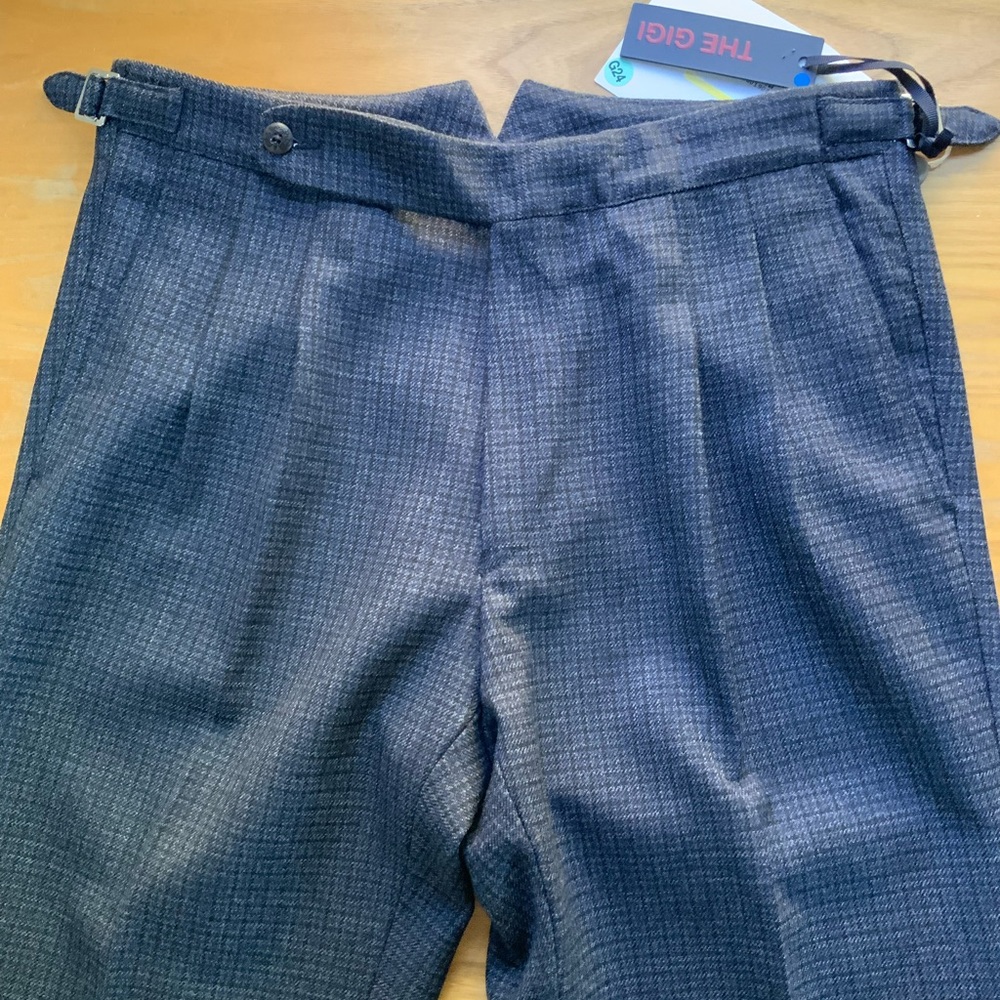 Men’s black/navy plaid wool pants by The GiGi. New